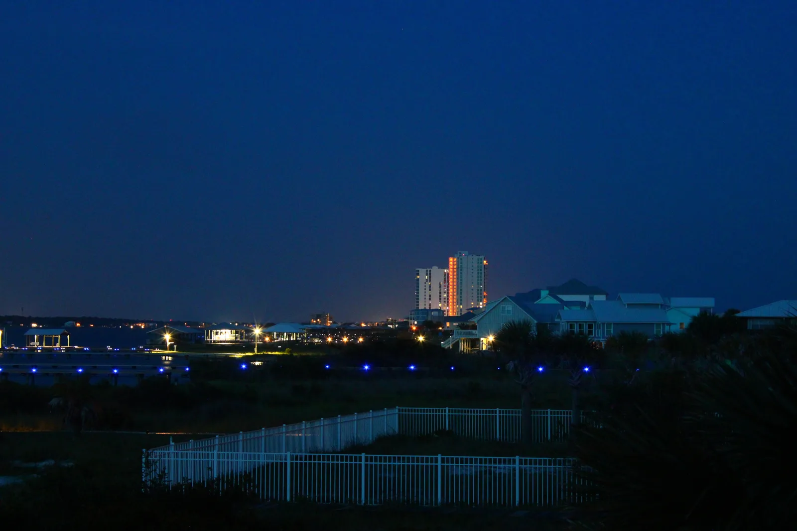 Gulf Shores skyline and vacation buildings at night